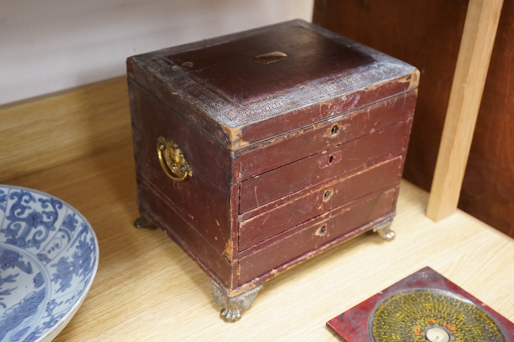 A Regency Morocco leather sewing and writing casket, 26cm and a Chinese Feng shui compass